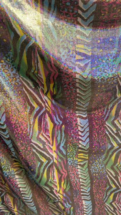 New Safari design multicolor Hologram metallic nylon spandex with foggy foil  4way stretch 58/60" Sold by the yd. Ships worldwide