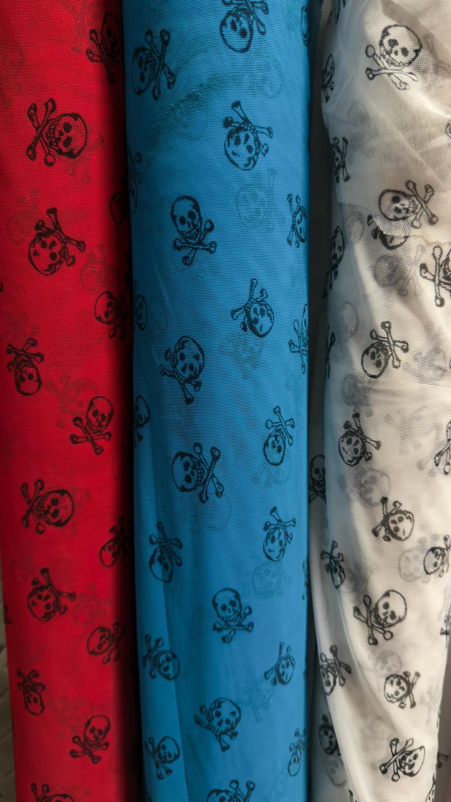 New power mesh skull desin nylon spandex  4 way stretch 58/60" Sold by the YD. Ships worldwide from Los Angeles California USA.