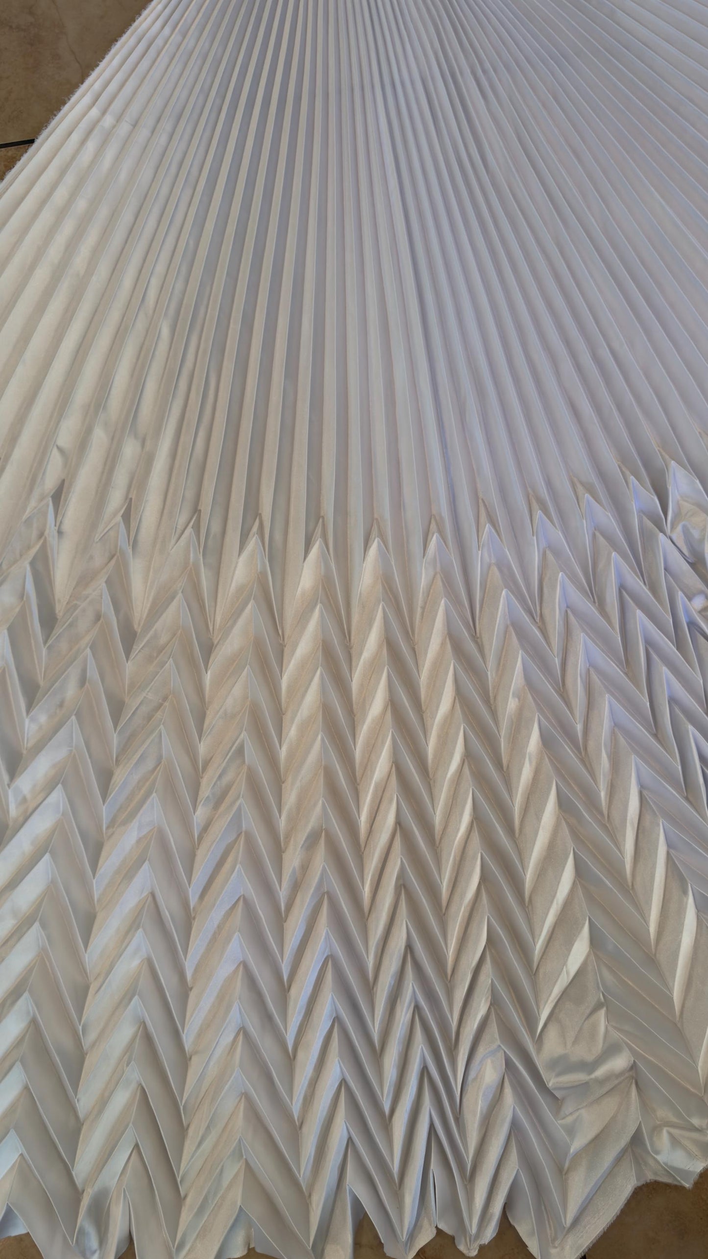 Sunburst pleated Chevron design Super Shiny Silky Satin  stretch 180” length by 60” width Sold by the PC. Ships worldwide from Los Angeles