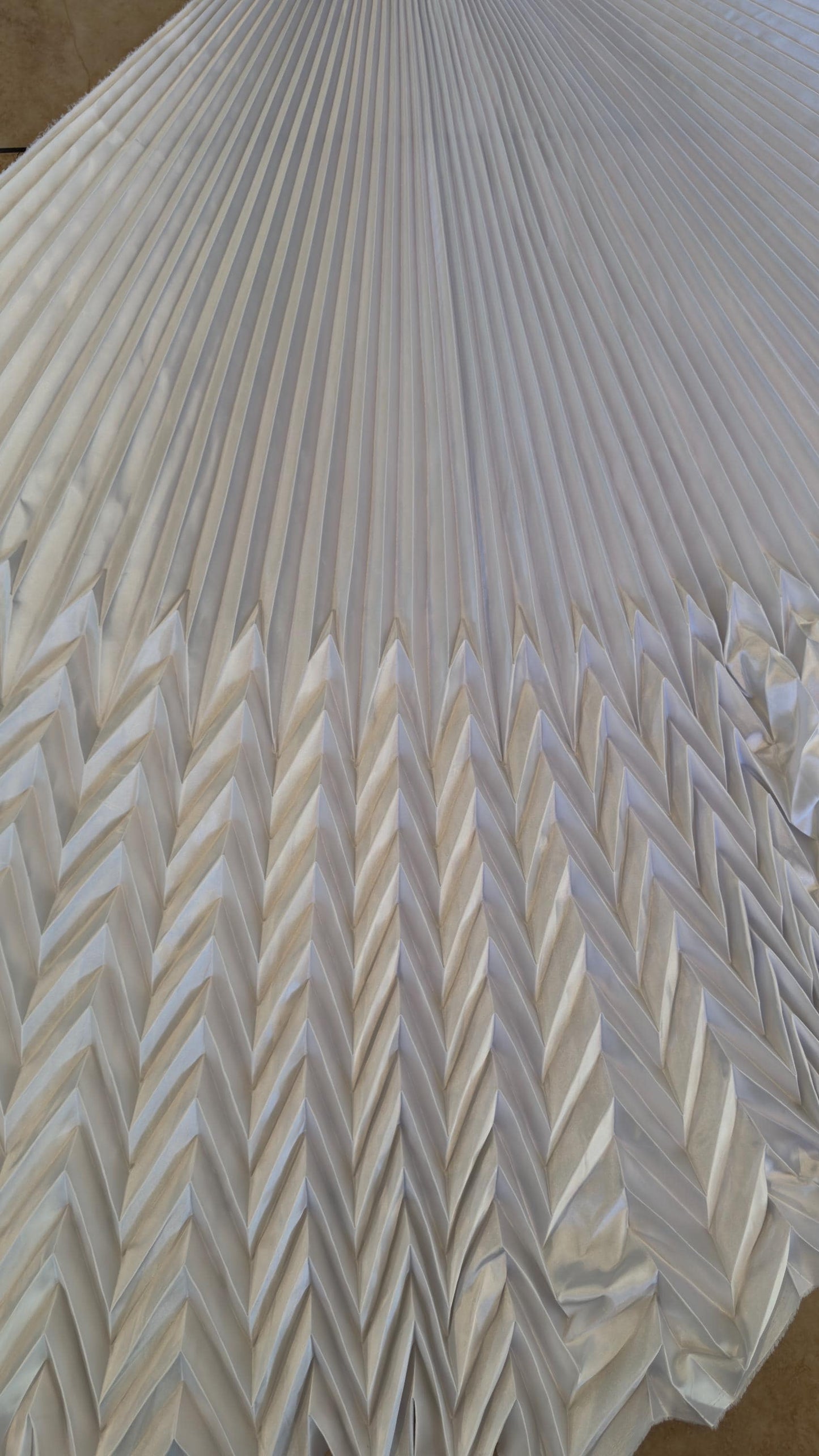 Sunburst pleated Chevron design Super Shiny Silky Satin  stretch 180” length by 60” width Sold by the PC. Ships worldwide from Los Angeles