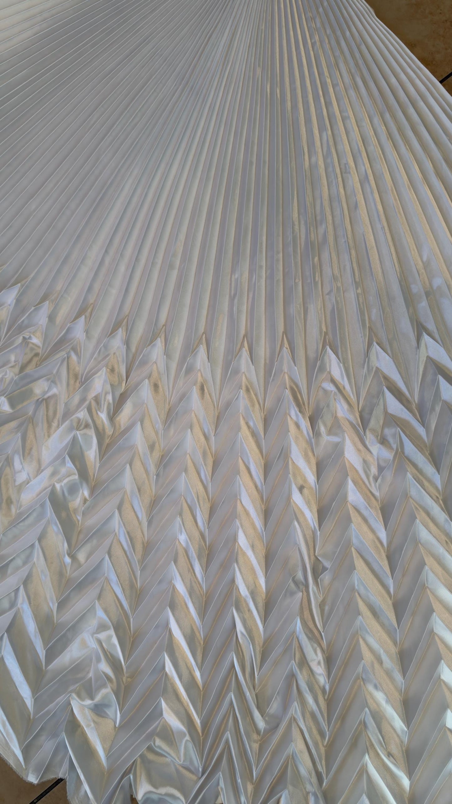 Sunburst pleated Chevron design Super Shiny Silky Satin  stretch 180” length by 60” width Sold by the PC. Ships worldwide from Los Angeles