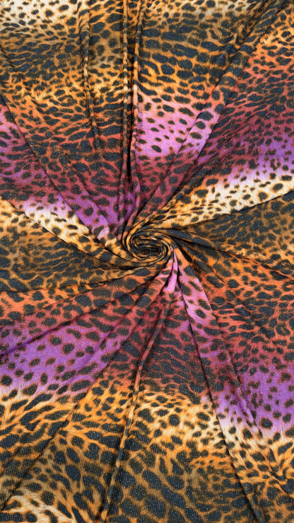 New Exotic Leopard design Metallic Lurex Poly Spandex 4Way Stretch 58/60" Sold BY The YD. Ships Worldwide From Los Angeles California USA.
