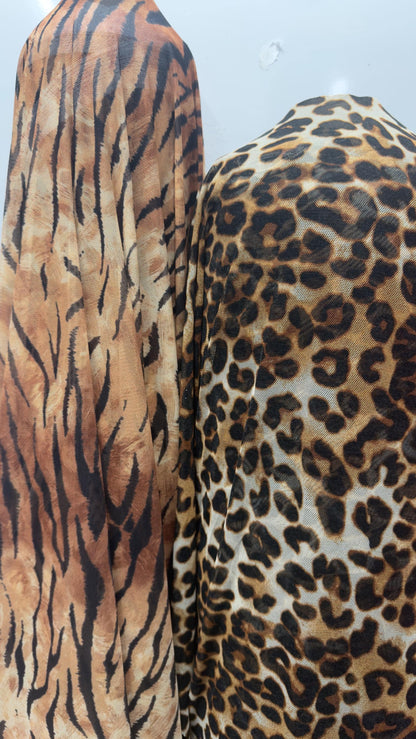 Exotic Tiger and Leopard design print on great quality of power mesh 4-way stretch 58/60” Sold by the YD. Ships Worldwide from Los Angeles