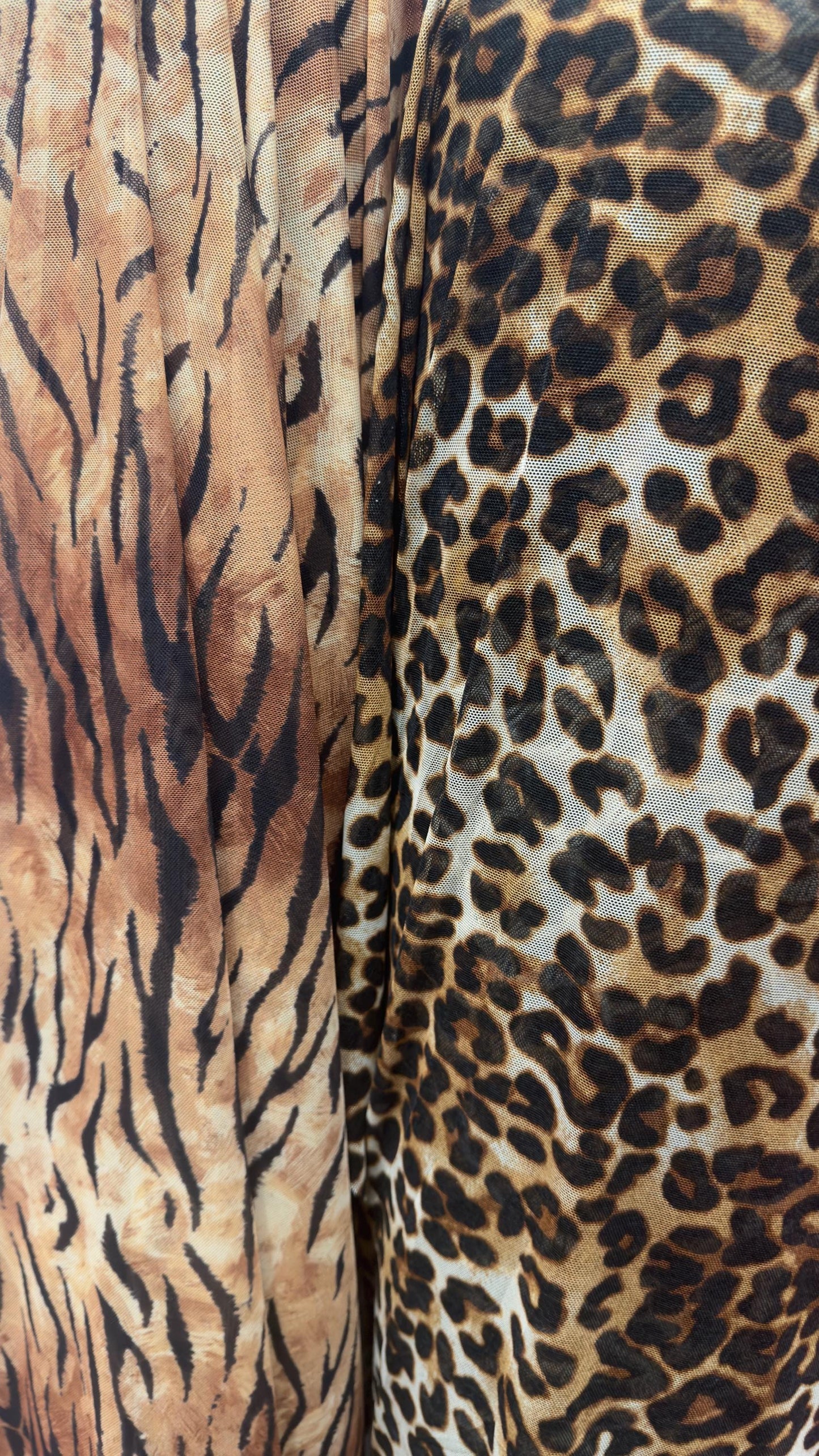 Exotic Tiger and Leopard design print on great quality of power mesh 4-way stretch 58/60” Sold by the YD. Ships Worldwide from Los Angeles