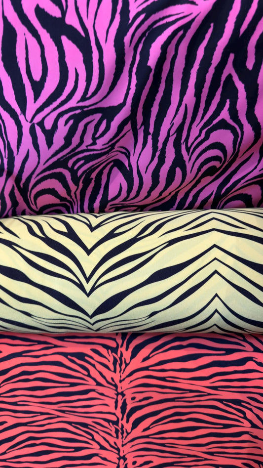 New Exotic zebra design print on nylon spandex 4way stretch 58/60" Sold by the YD. Ships worldwide from Los Angeles California USA.