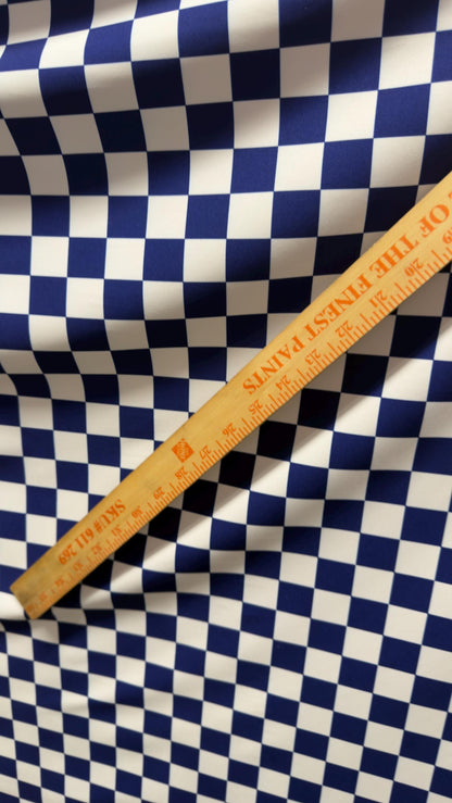 Sapphire/White Checkered design 1" print on nylon spandex 4way stretch 58/60" Sold by the YD. Ships worldwide from Los Angeles California