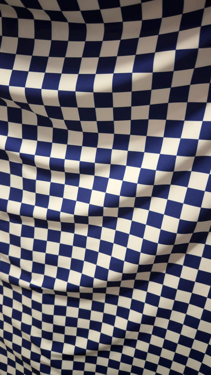 Sapphire/White Checkered design 1" print on nylon spandex 4way stretch 58/60" Sold by the YD. Ships worldwide from Los Angeles California