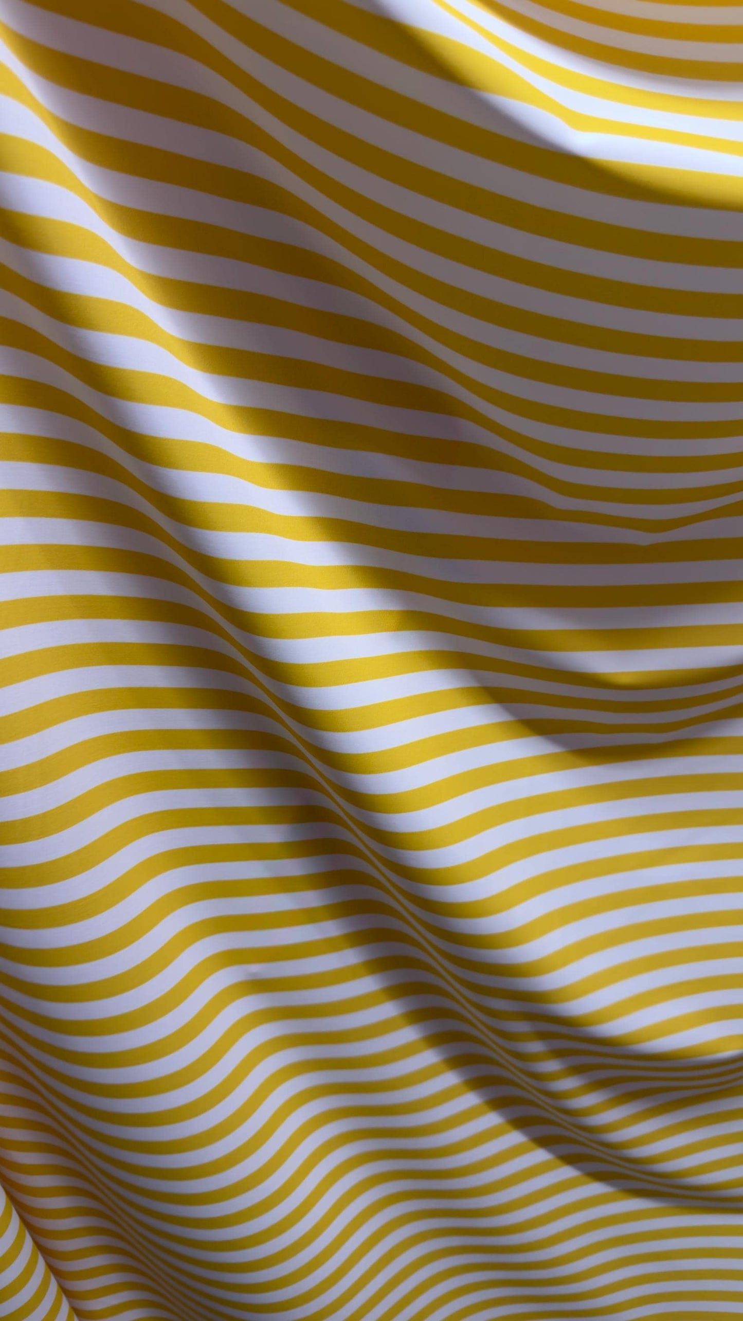 Stripes design on nylon spandex 4way stretch 58/60" Sold by the YD. Ships worldwide from Los Angeles California USA. High quality fabrics