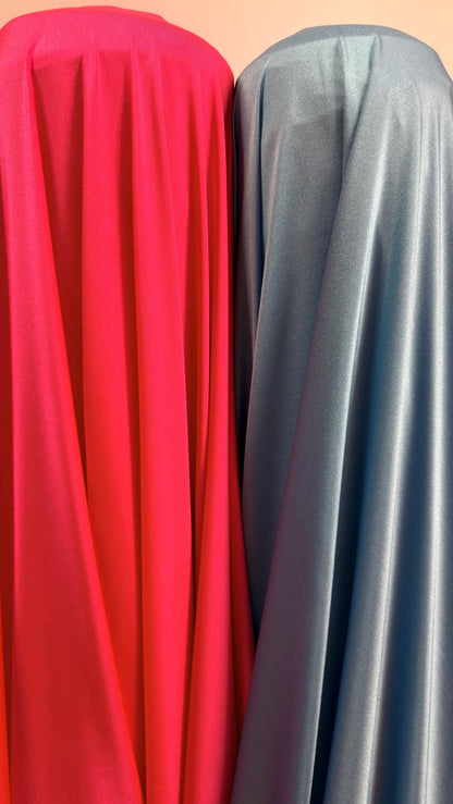 Great quality shiny Neon Red and Columbia nylon spandex 4-way stretch 58/60” Sold by the YD. Ships worldwide from Los Ángeles California