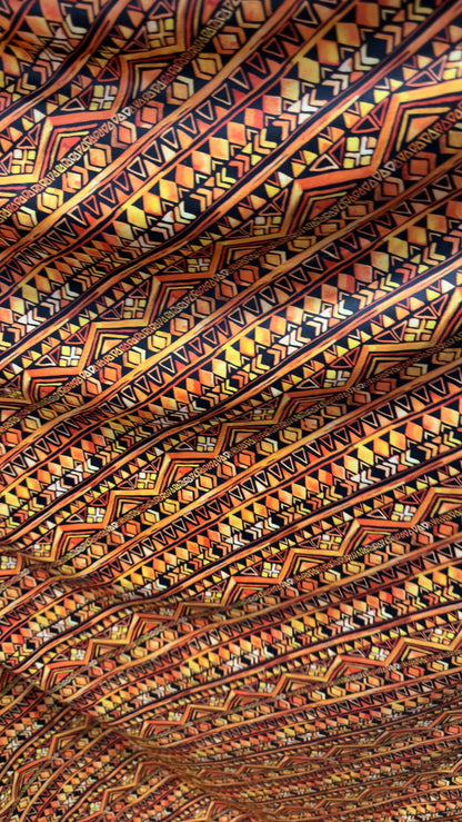 AZTEC design Yellow/Orange on nylon spandex 4way Stretch 58/60" Sold by the yd Ships worldwide from Los Angeles California USA.