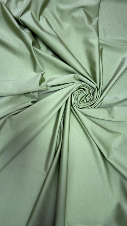 Great quality shiny Kiwi nylon spandex 4-way stretch 58/60” Sold by the YD. Ships worldwide from Los Ángeles California USA.