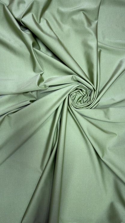 Great quality shiny Kiwi nylon spandex 4-way stretch 58/60” Sold by the YD. Ships worldwide from Los Ángeles California USA.