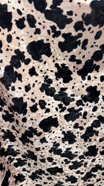 Exotic Cow design print on great quality of Crushed stretch velvet 4-way stretch 58/60” Sold by the YD. Ships worldwide from Los Angeles CA