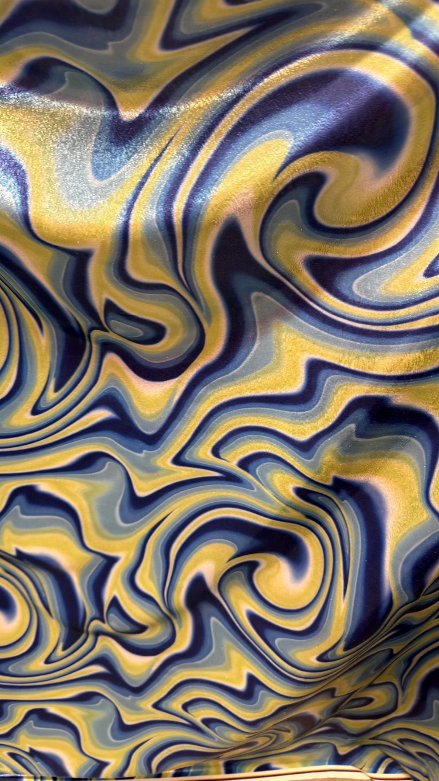 New Modern abstract lava design Blue/Yellow  on foggy foil metallic nylon spandex 4-way stretch 58/60” Sold by the YD.