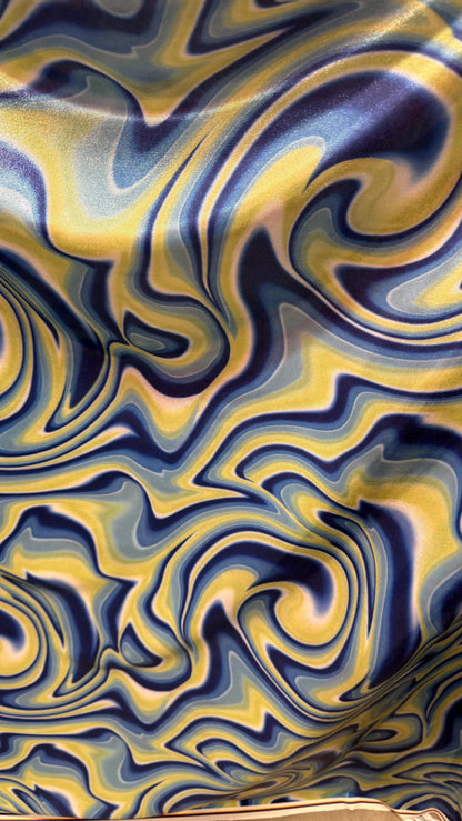 New Modern abstract lava design Blue/Yellow  on foggy foil metallic nylon spandex 4-way stretch 58/60” Sold by the YD.