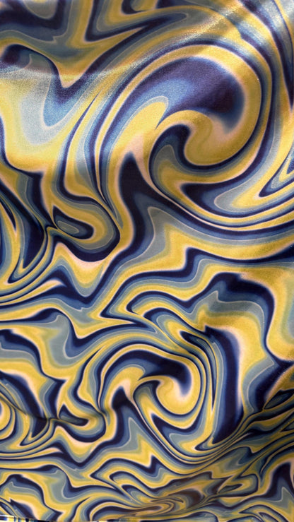 New Modern abstract lava design Blue/Yellow  on foggy foil metallic nylon spandex 4-way stretch 58/60” Sold by the YD.