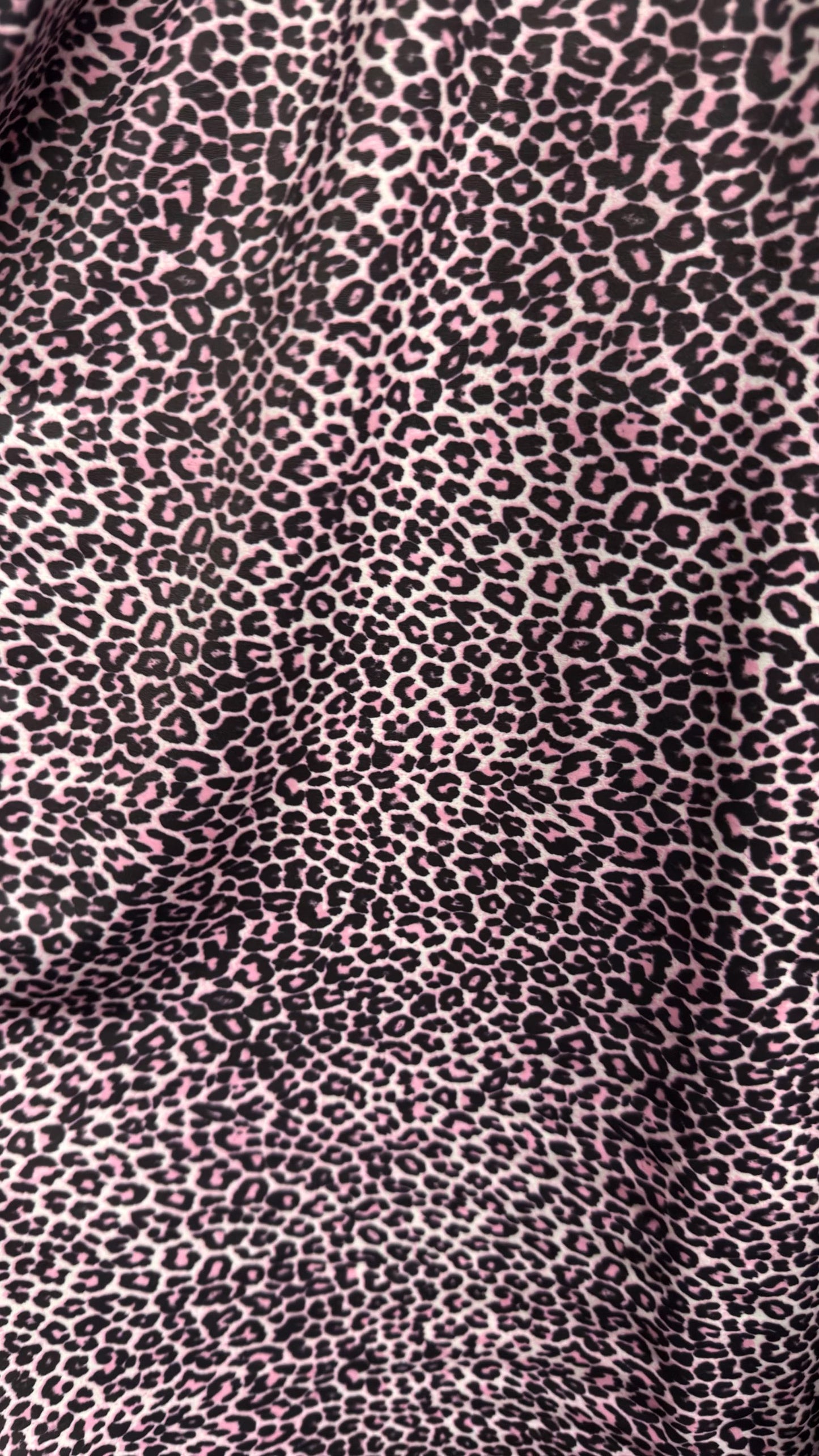 New Exotic cheetah design Violet Pink on metallic shattered glass nylon spandex and regular nylon spandex  4-way stretch 58/60”