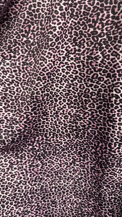 New Exotic cheetah design Violet Pink on metallic shattered glass nylon spandex and regular nylon spandex  4-way stretch 58/60”
