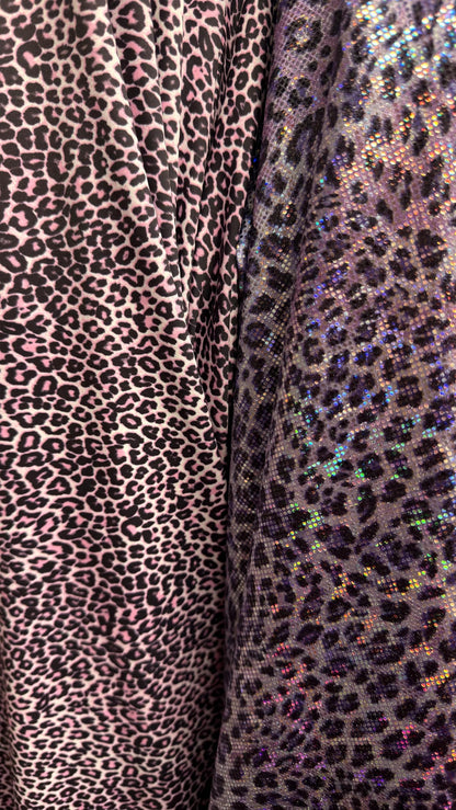New Exotic cheetah design Violet Pink on metallic shattered glass nylon spandex and regular nylon spandex  4-way stretch 58/60”