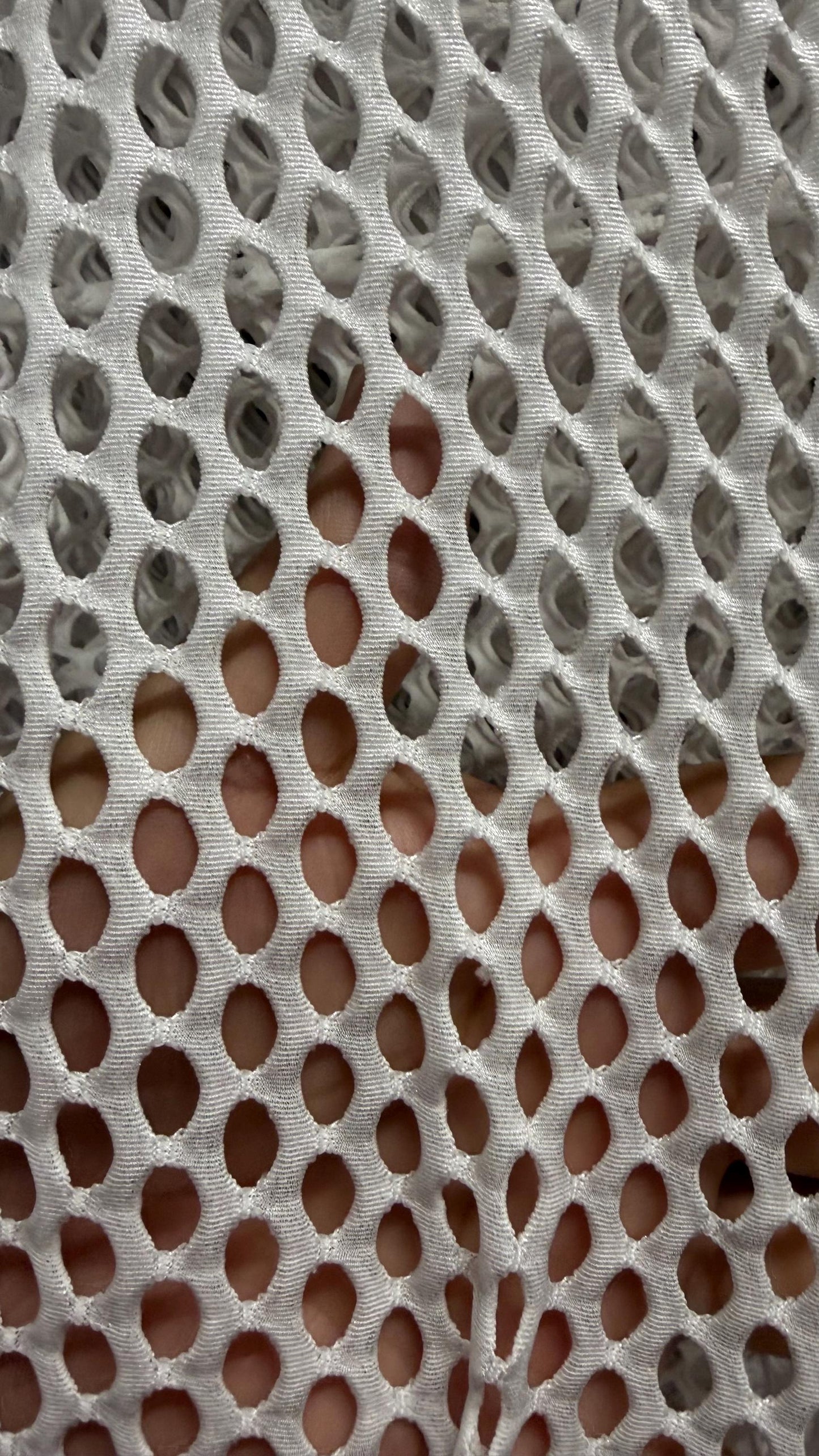 Metallic diamond mesh design medium size nylon mesh 4-way stretch 58/60” Sold by the YD. Ships worldwide from Los Angeles California USA.