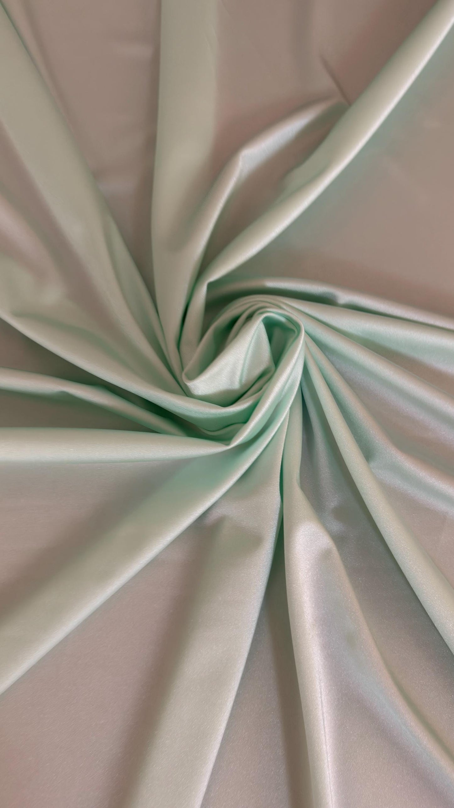 Great quality shiny Soft Mint color nylon spandex 4-way stretch 58/60” Sold by the YD. Ships worldwide from Los Ángeles California USA.