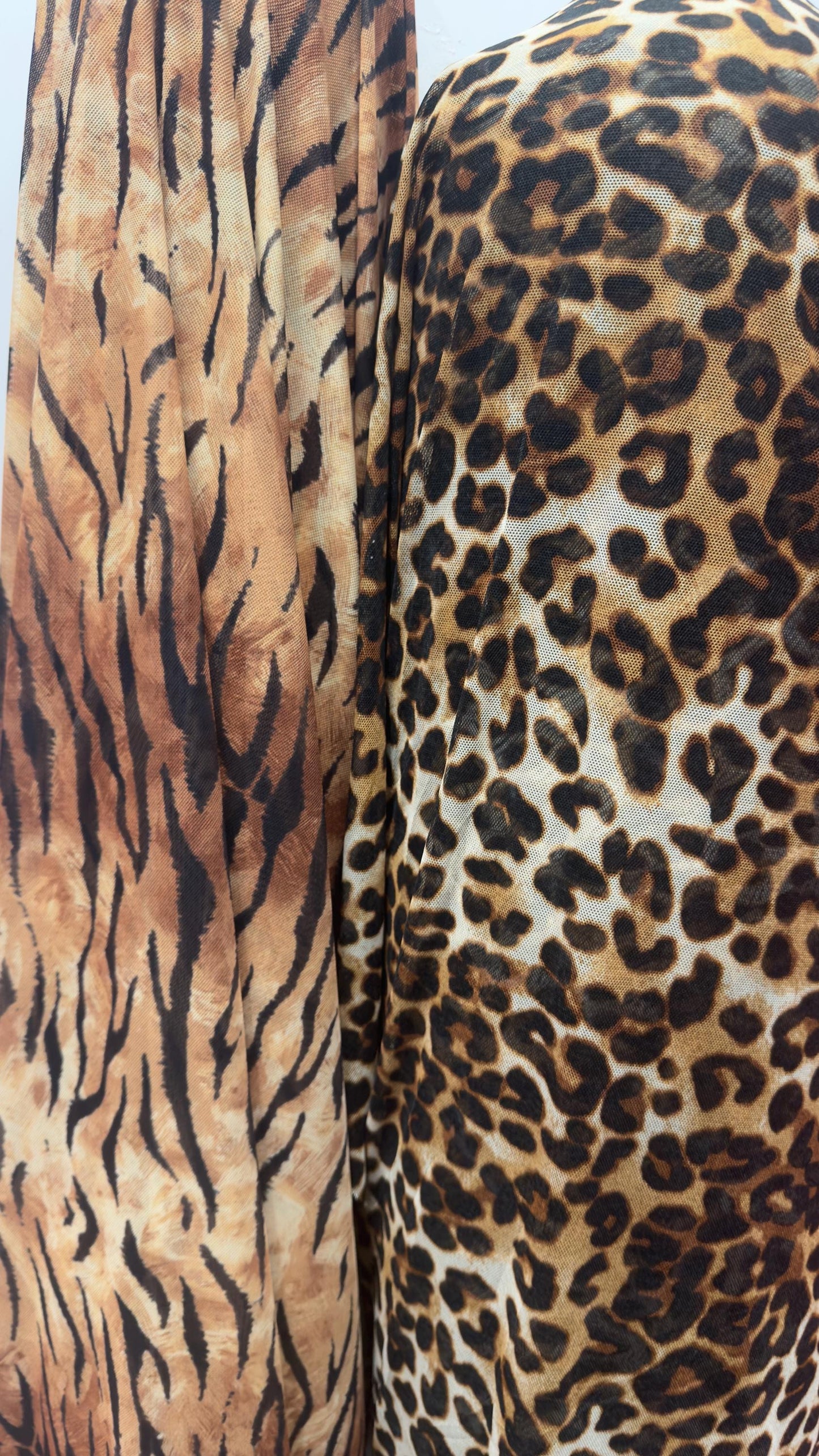 Exotic Tiger and Leopard design print on great quality of power mesh 4-way stretch 58/60” Sold by the YD. Ships Worldwide from Los Angeles