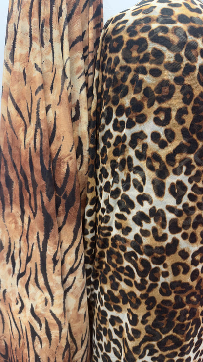 Exotic Tiger and Leopard design print on great quality of power mesh 4-way stretch 58/60” Sold by the YD. Ships Worldwide from Los Angeles