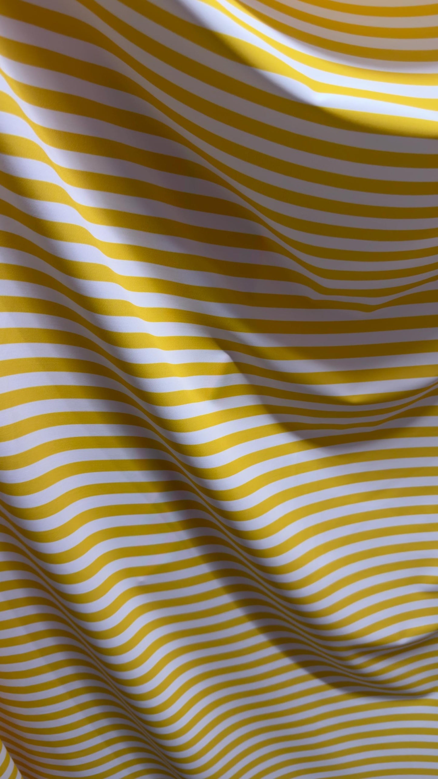 Stripes design on nylon spandex 4way stretch 58/60" Sold by the YD. Ships worldwide from Los Angeles California USA. High quality fabrics