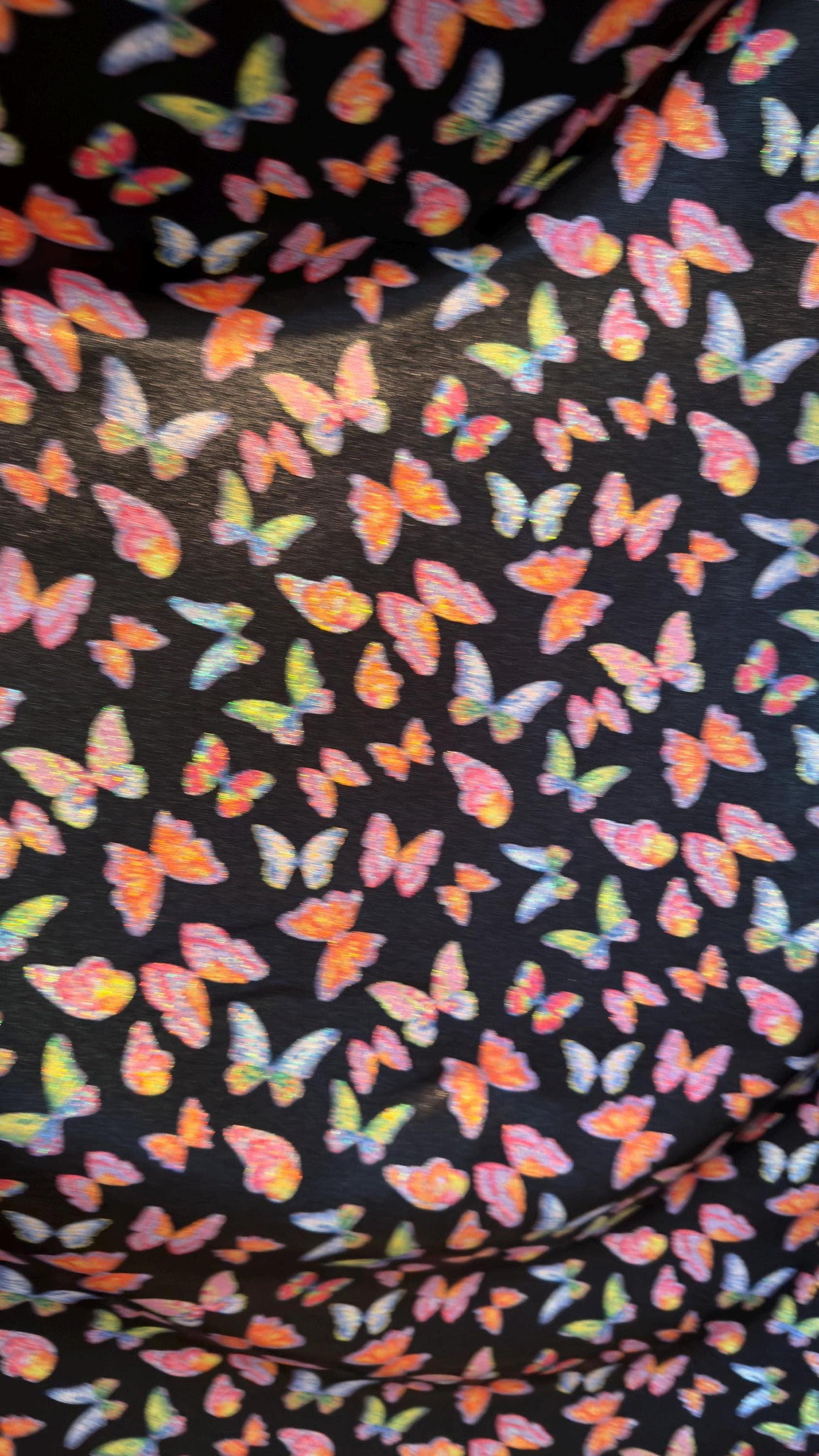 Exotic Butterfly design Multicolors print on great quality of Hologram metallic nylon spandex with foggy foil 4-way stretch 58/60”