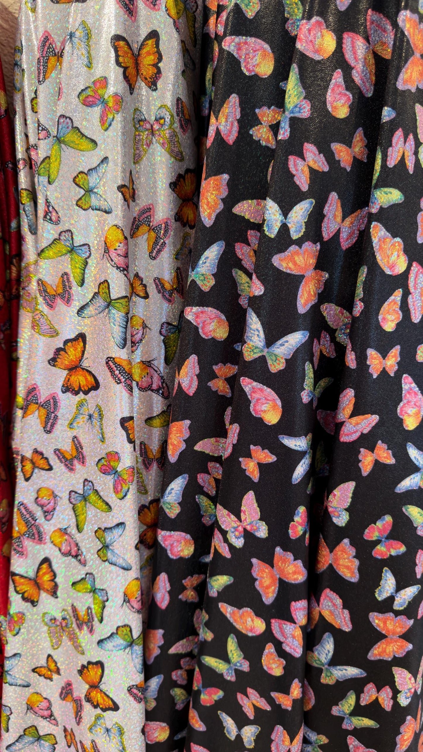 Exotic Butterfly design Multicolors print on great quality of Hologram metallic nylon spandex with foggy foil 4-way stretch 58/60”