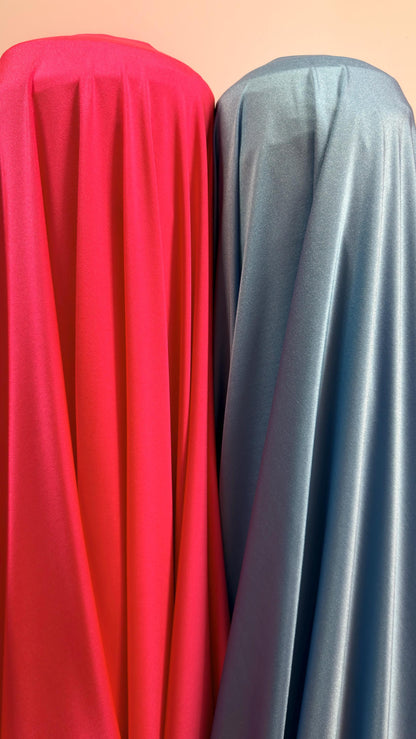 Great quality shiny Neon Red and Columbia nylon spandex 4-way stretch 58/60” Sold by the YD. Ships worldwide from Los Ángeles California
