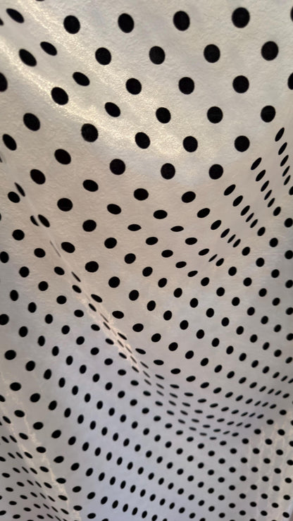 New Polka Dots flocking design  on great quality of crystal Silky Organza non stretch 58/60” Sold by the YD. Ships worldwide from LA CA