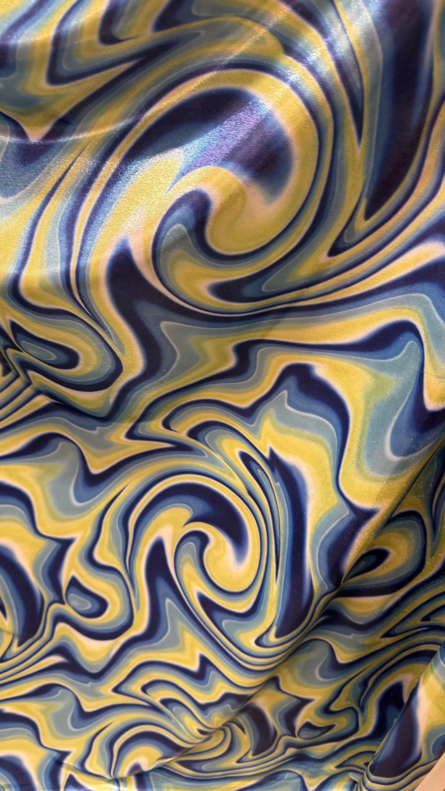 New Modern abstract lava design Blue/Yellow  on foggy foil metallic nylon spandex 4-way stretch 58/60” Sold by the YD.