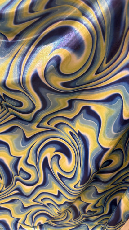 New Modern abstract lava design Blue/Yellow  on foggy foil metallic nylon spandex 4-way stretch 58/60” Sold by the YD.