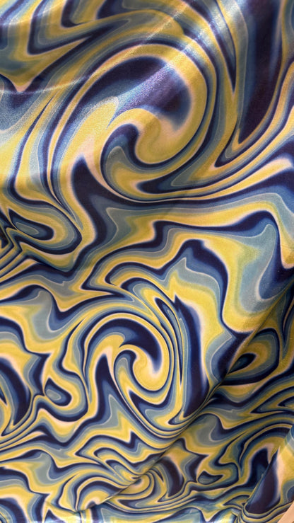 New Modern abstract lava design Blue/Yellow  on foggy foil metallic nylon spandex 4-way stretch 58/60” Sold by the YD.