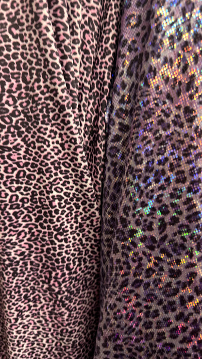 New Exotic cheetah design Violet Pink on metallic shattered glass nylon spandex and regular nylon spandex  4-way stretch 58/60”