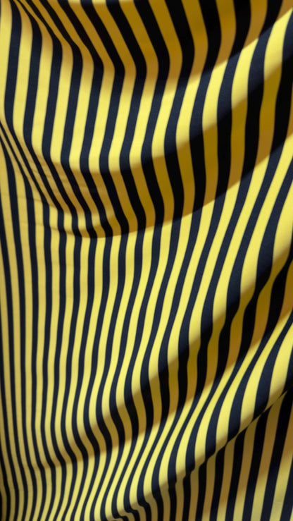 Stripe design print on poly spandex 4way stretch 58/60" sold by the yd. Ships worldwide from Los Angeles California USA. High quality fabric