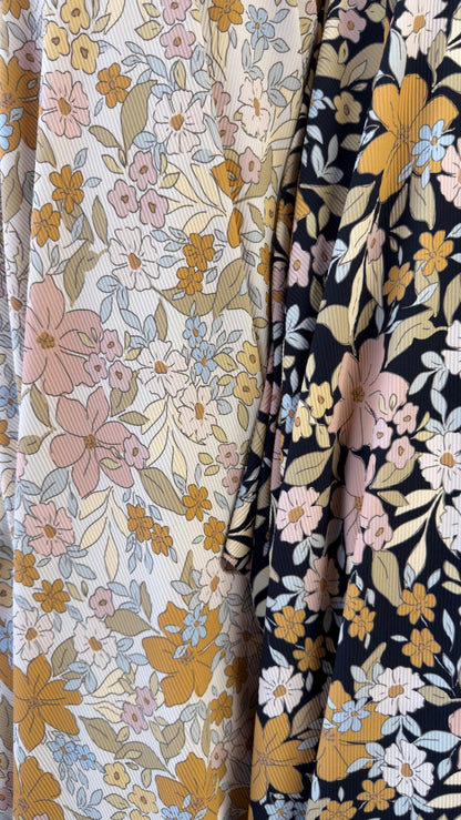 New Floral design print on rib nylon spandex 4-way stretch 58/60” Sold by the YD. Ships Worldwide from Los Angeles California USA.