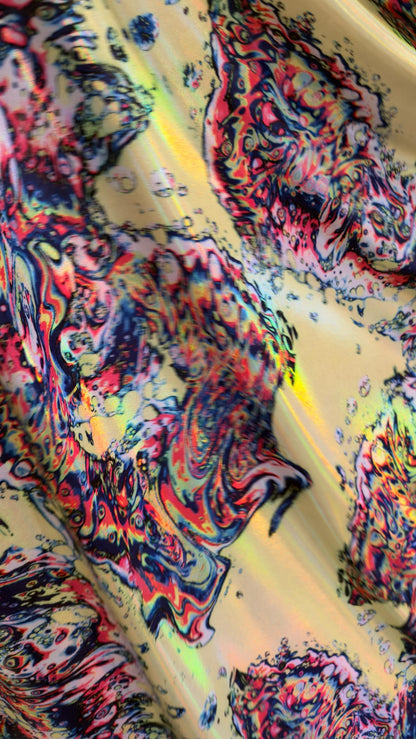 New Abstract Lava design with Iridescent metallic hologram foil 4way stretch 58/60" Sold by the YD. Ships worldwide from Los Angeles CA
