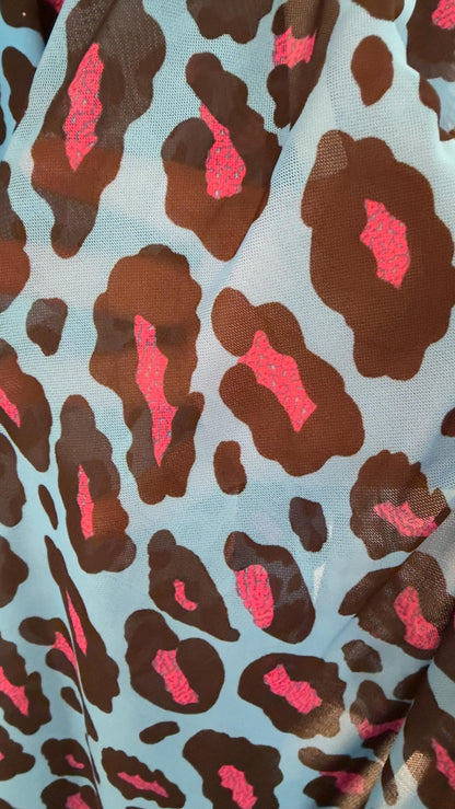 Exotic Leopard design Turquoise/Pink print on nylon spandex and power mesh nylon spandex  4-way stretch Green /black 58/60” Sold by the YD.