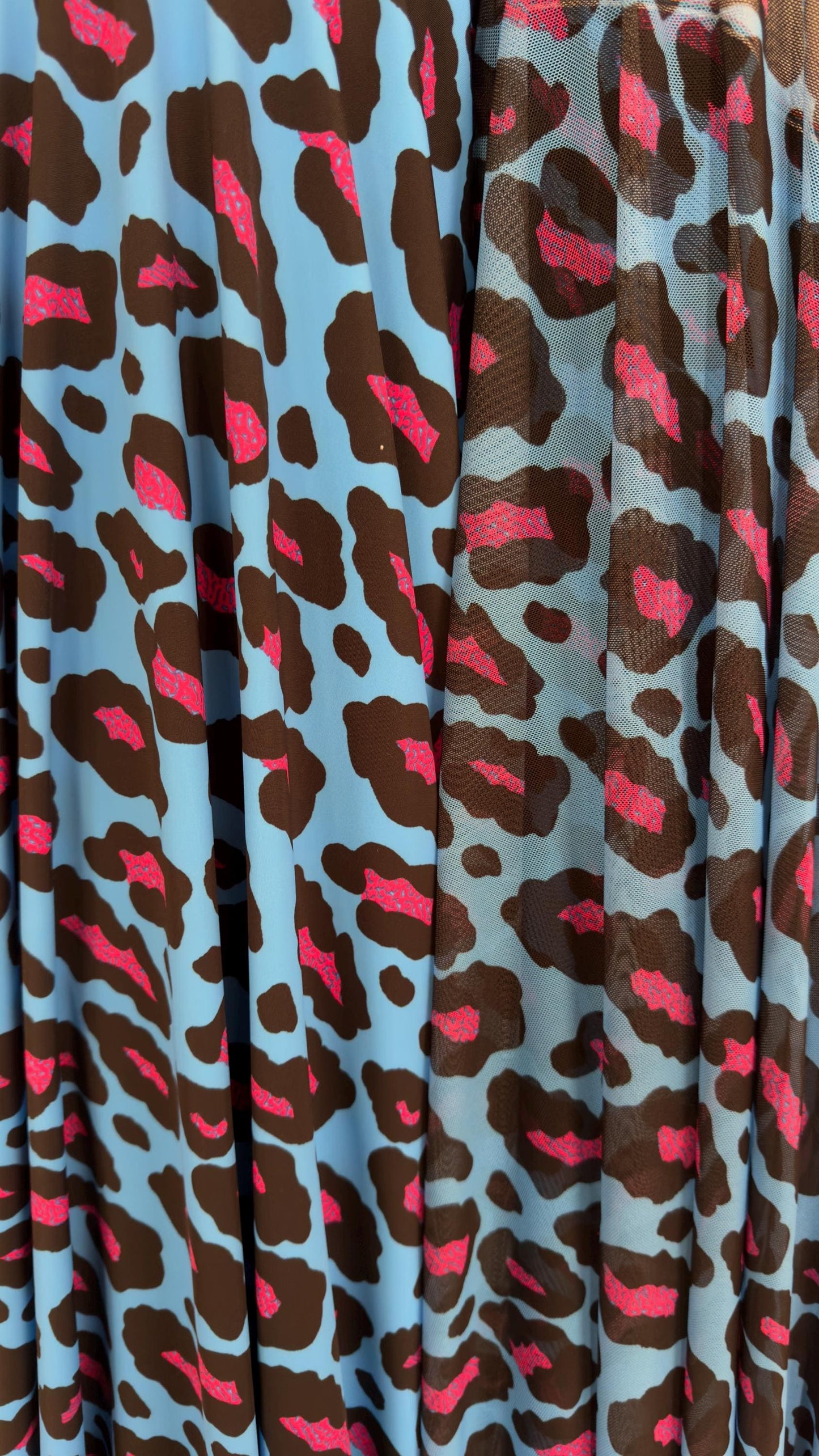 Exotic Leopard design Turquoise/Pink print on nylon spandex and power mesh nylon spandex  4-way stretch Green /black 58/60” Sold by the YD.
