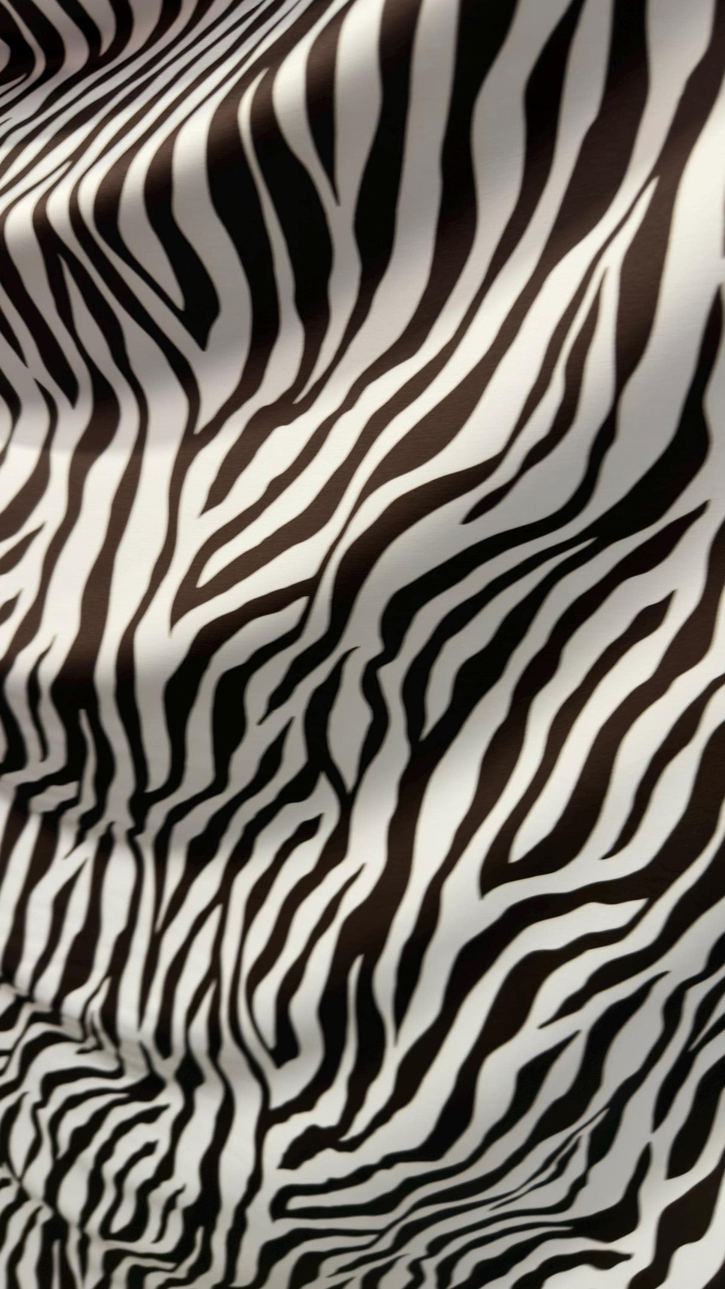 New exotic Brown zebra design print on nylon spandex 4-way Stretch 58/60” Sold by the YD. Ships worldwide from Los Angeles California USA.