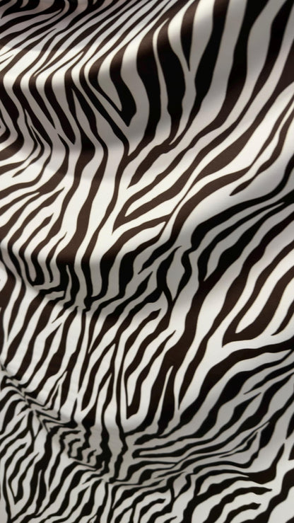 New exotic Brown zebra design print on nylon spandex 4-way Stretch 58/60” Sold by the YD. Ships worldwide from Los Angeles California USA.