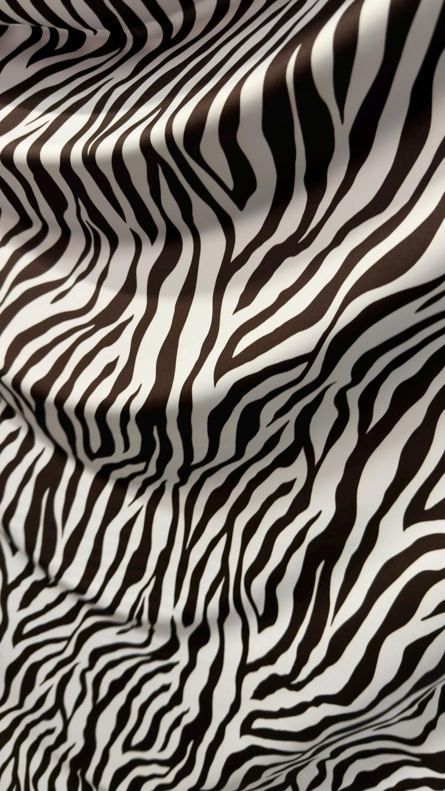 New exotic Brown zebra design print on nylon spandex 4-way Stretch 58/60” Sold by the YD. Ships worldwide from Los Angeles California USA.