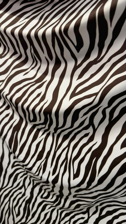 New exotic Brown zebra design print on nylon spandex 4-way Stretch 58/60” Sold by the YD. Ships worldwide from Los Angeles California USA.