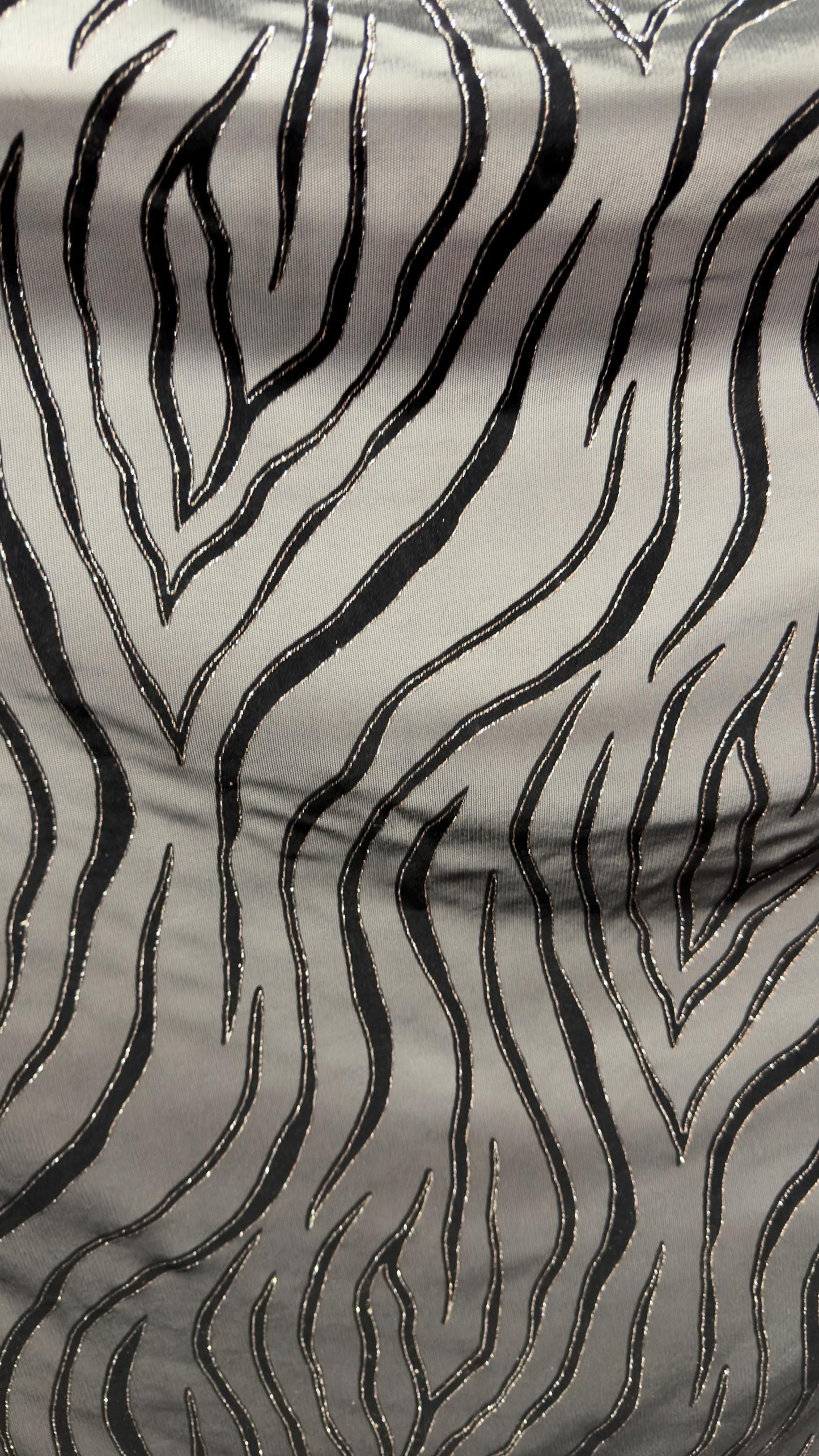 Exotic Tiger design on stretch mesh nylon spandex with flocking 4-way stretch 58/60” Sold by the YD. Ships Worldwide from Los Angeles CA USA