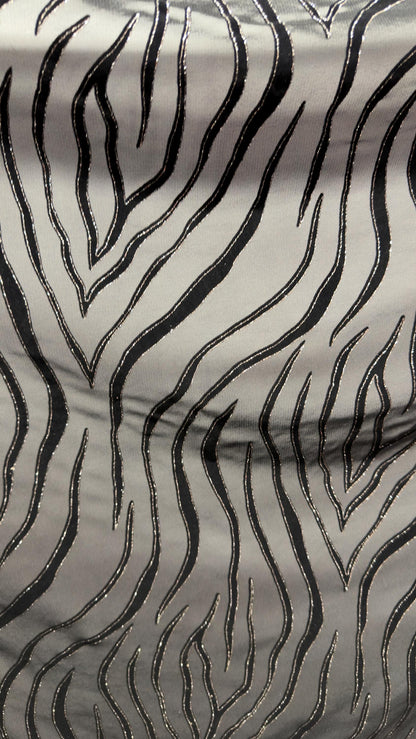Exotic Tiger design on stretch mesh nylon spandex with flocking 4-way stretch 58/60” Sold by the YD. Ships Worldwide from Los Angeles CA USA