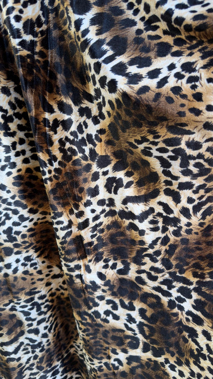 New Leopard print Brown/Black on heavy stretch velvet 4way stretch 58/60" Sold by the YD. Ships worldwide from Los Ángeles California USA.