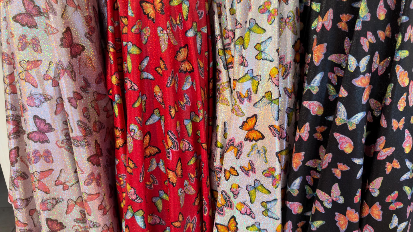 Exotic Butterfly design Multicolors print on great quality of Hologram metallic nylon spandex with foggy foil 4-way stretch 58/60”