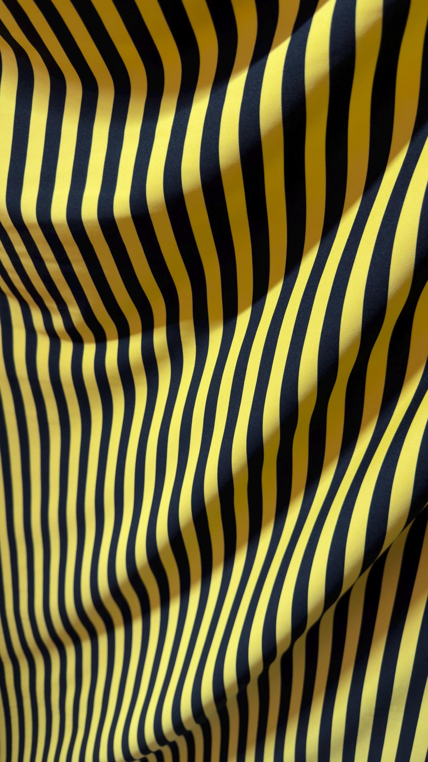Stripe design print on poly spandex 4way stretch 58/60" sold by the yd. Ships worldwide from Los Angeles California USA. High quality fabric